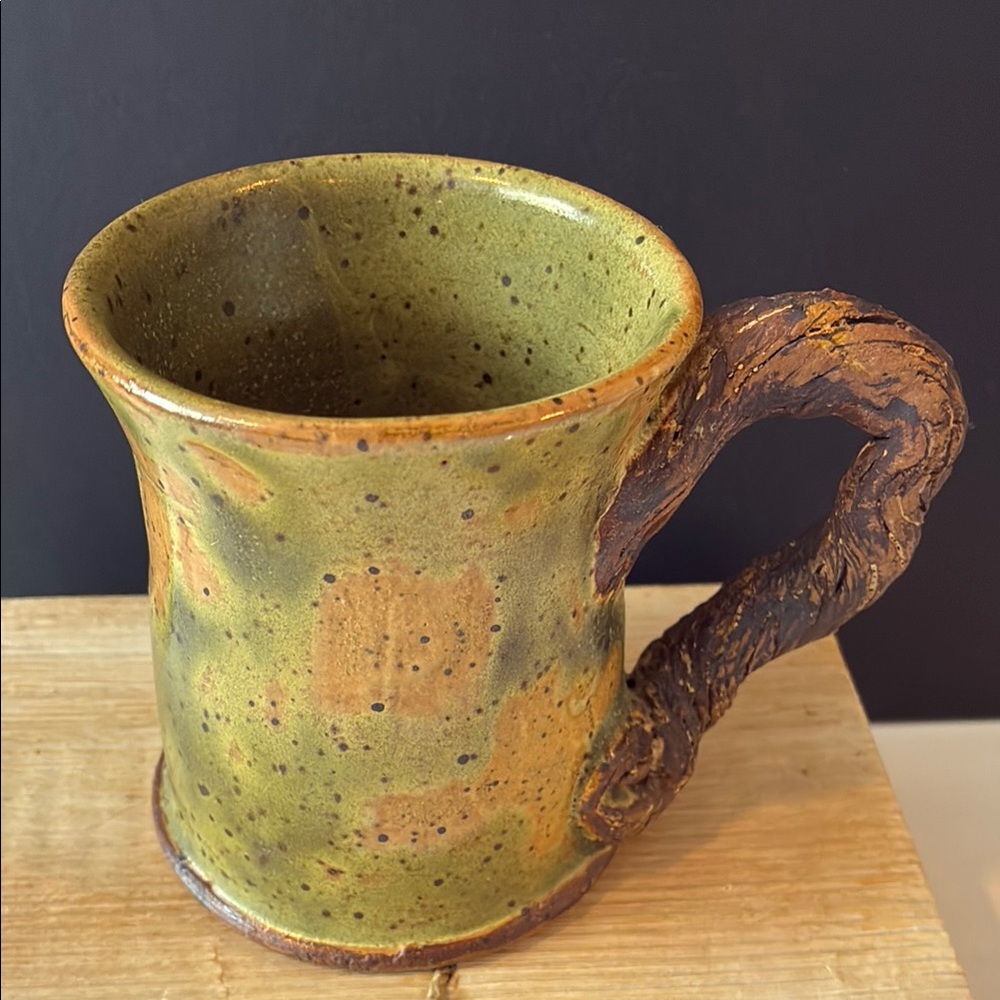 Handmade ceramic mug. Signed and dated by artist. Preowned